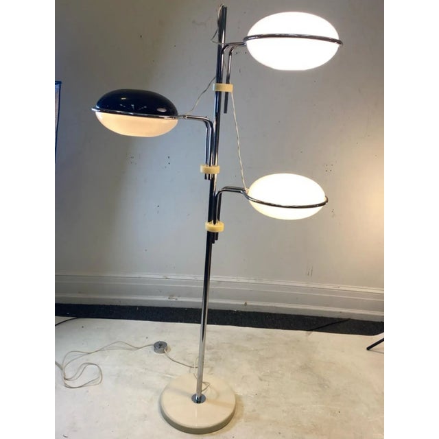 Unusual Mod Three Plexiglass Globe Floor That Has Adjustable Arms So you can direct The Shades. There Are Two White Shades...