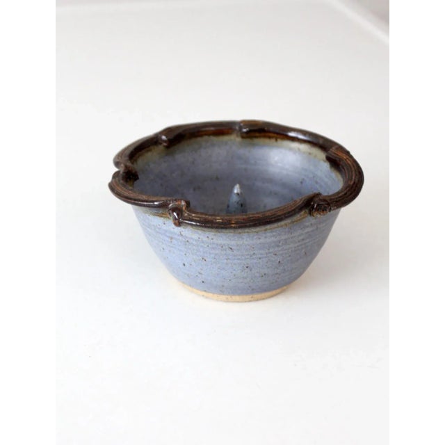 This vintage handmade pottery apple baker bowl is signed by Tennessee potter James Coffelt. It features a speckled blue...