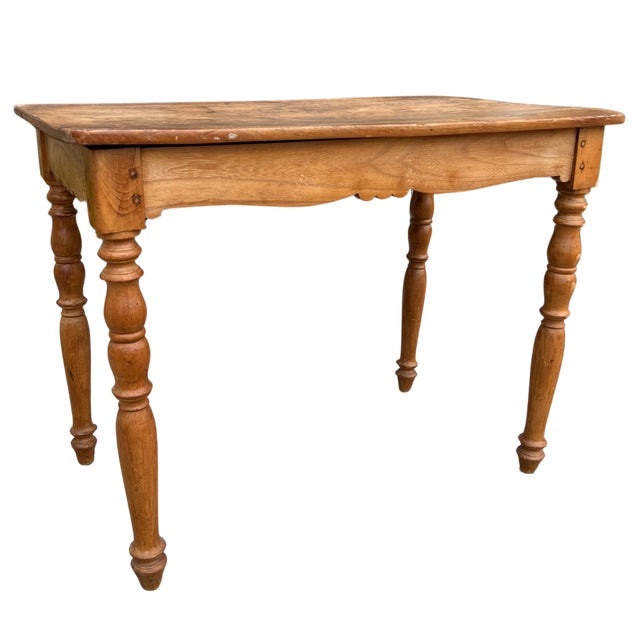 Circa early 20th Century France. Enhance your decor with this charming French side table, crafted from beautiful...