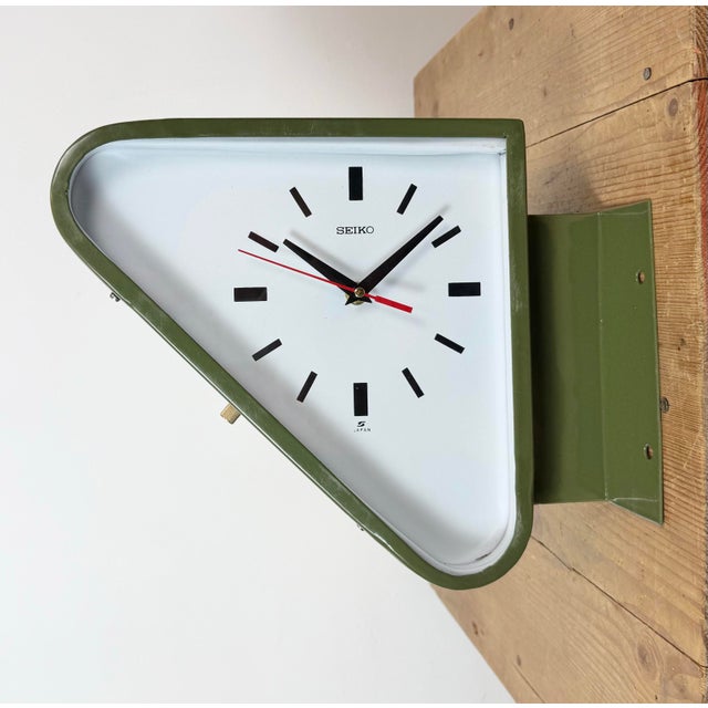 Vintage Industrial triangle maritime wall clock made by SEIKO in Japan during the 1970s. These clocks were used on large...