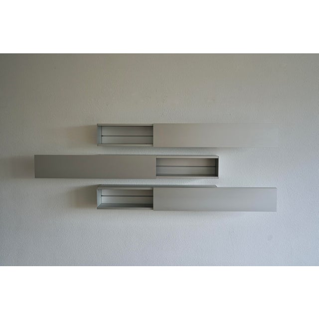 A set of three finely engineered A-Line 'Horizontals' that are made from anodised aluminium. They each have softly sliding...