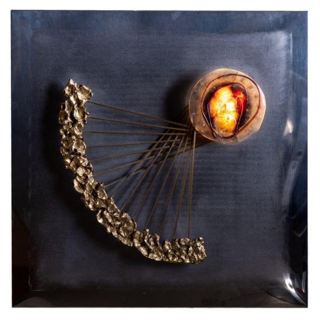 An Angelo Brotto wall sculpture for Esperia. Featuring a backlit glass Murano glass detail. Crafted in Steel and brass...