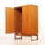 This mid-century armoire was produced by G Plan as part of their 'Quadrille' range during the 1960s. A sleek, teak...