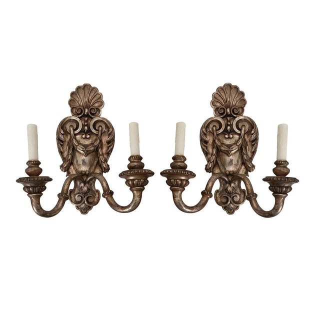 An elegant pair of silver gilt wall sconces hand-crafted in France in the (early) 20th century. Each of these lustrous...