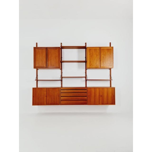 Large mid-century Danish teak wall unit with three cabinets by Poul Cadovius for Cado, Denmark, 1960s. Danish design by...