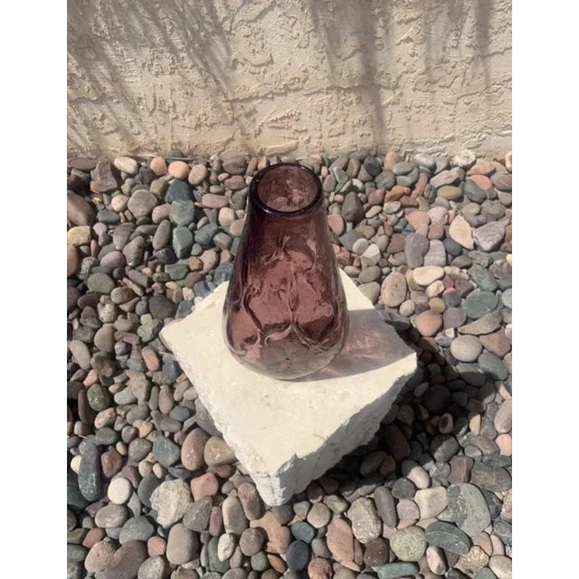 beautiful plum color glass to showcase lovely flowers.