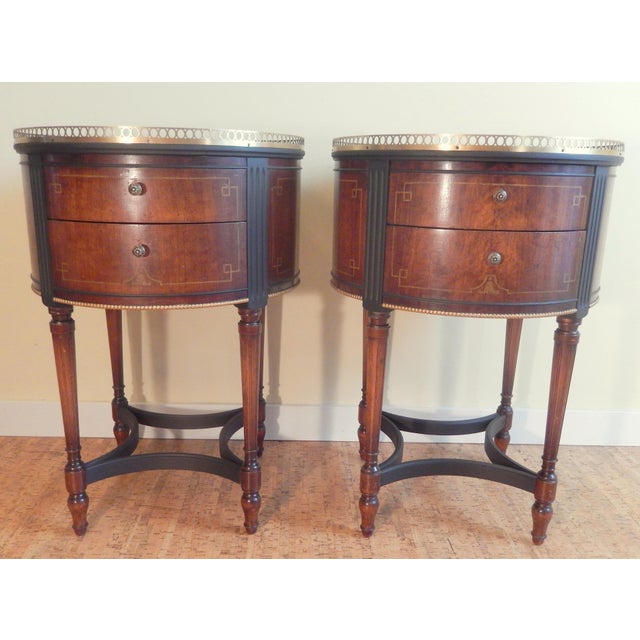 These superb vintage pair of mahogany tables were hand-crafted in the early 1900's and are finished on all sides....