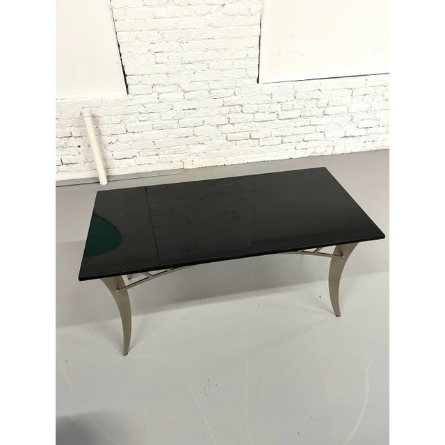 Use as a center hall table or a coffee table ideally suited for larger higher sofas/chairs. Made with polished 1/2" black...