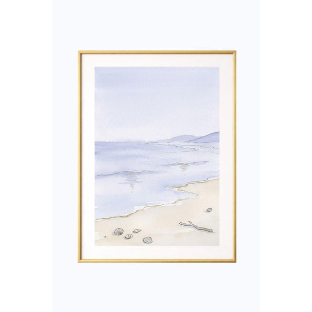Coastal shoreline wall art featuring a soft pastel beach scene with gentle waves, delicate linework, and subtle gold...