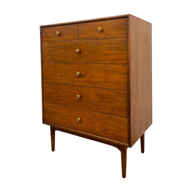 This authentic mid-century modern tallboy chest of drawers features a premium book-matched American walnut veneer with a...