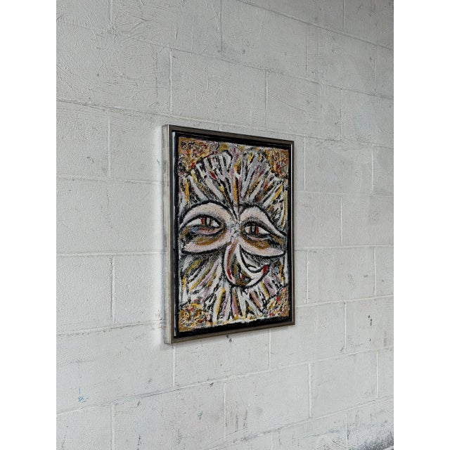 This striking painting features a stylized abstract face utilizing heavy impasto techniques. The expressive design creates...