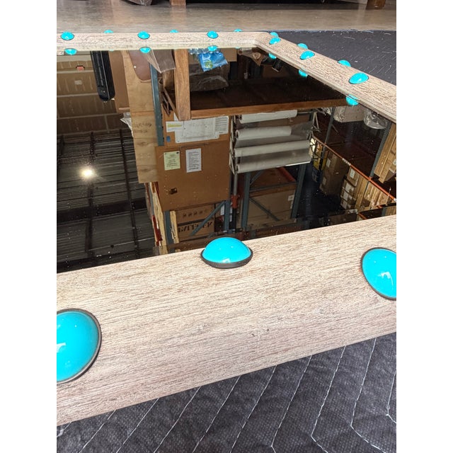 Rustic contemporary oak mirror featuring a grey wood frame accented with vibrant aqua dots. The clean rectangular shape...