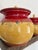 A charming set of three hand decorated French ceramic lidded canisters traditionally used to store dry pantry goods such...