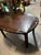 Up for consideration is a beautiful vintage wooden campaign style coffee table/tray table. This is a lovely accent piece...
