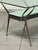 Elegant coffee table by Cesare Lacca, dating back to the 1950s. An iconic piece of 1950s Italian design, featuring a...