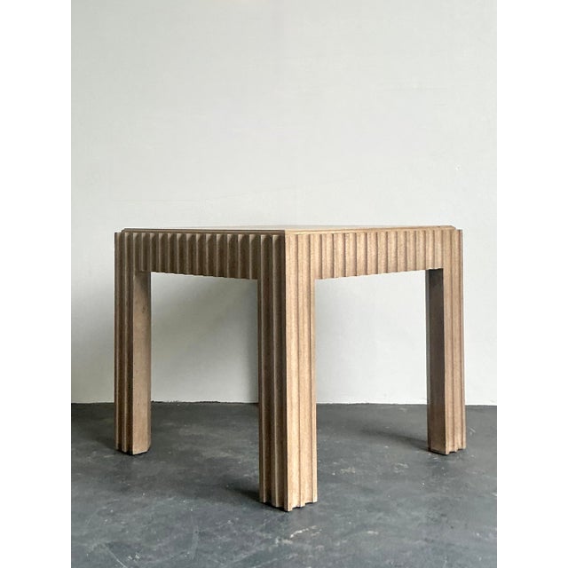 Introduce sculptural sophistication to your home with this vintage Marge Carson game table, a masterclass in Postmodern...