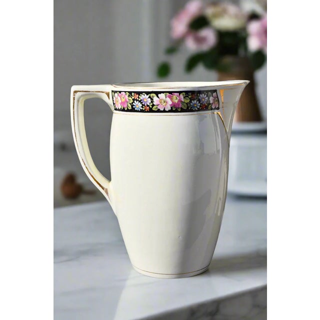 BOCH FRÈRES KERAMIS ART DECO PITCHER Era: Early 1920s Origin: La Louvière, Belgium OVERVIEW: A refined Art Deco pitcher...
