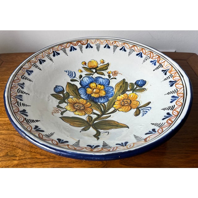 This lovely hand-painted large earthenware handmade Spanish bowl is perfect to use as a centerpiece bowl or has hanging to...
