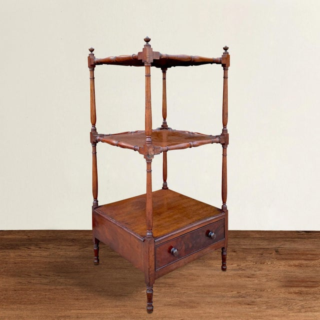 A fantastic 19th century English mahogany whatnot, or tired stand, with beautifully turned support columns, with turned...
