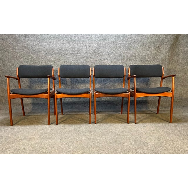 Here's is an amazing set of 4 of the quintessential Danish teak dining chairs designed by Erik Buch Model 49 and 50 ....
