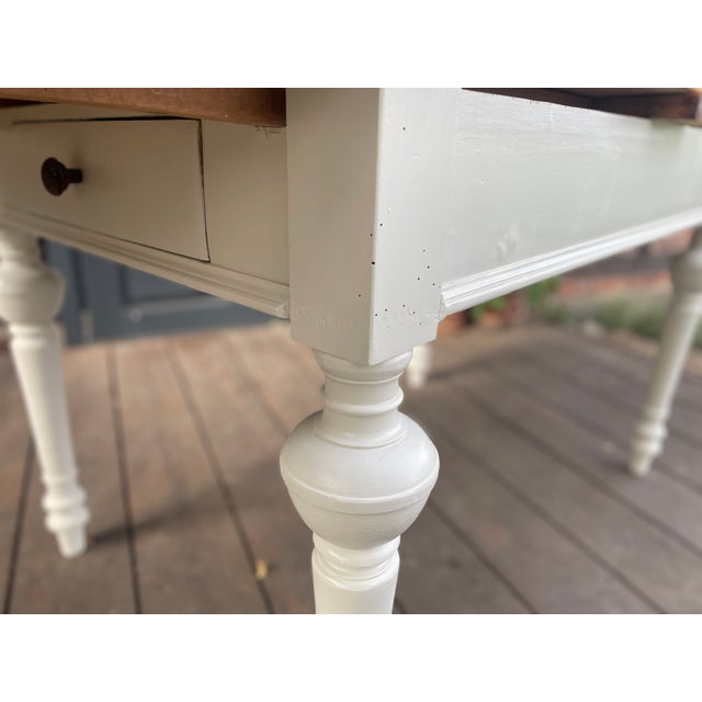 This charming antique extendable table has been given a fresh coat of paint, sanded, and oiled. Width: 115.5 cm, each...