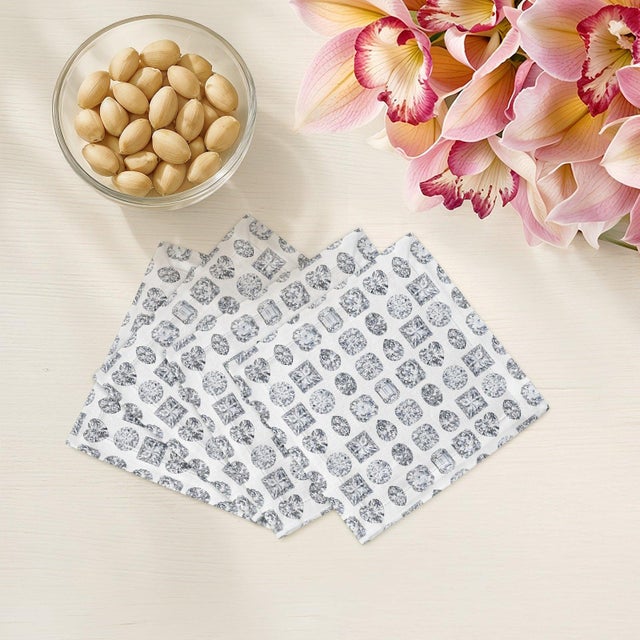 Radiating a brilliant, multi-faceted energy through its precise geometric pattern, this Bougie Diamonds Cocktail Napkins...