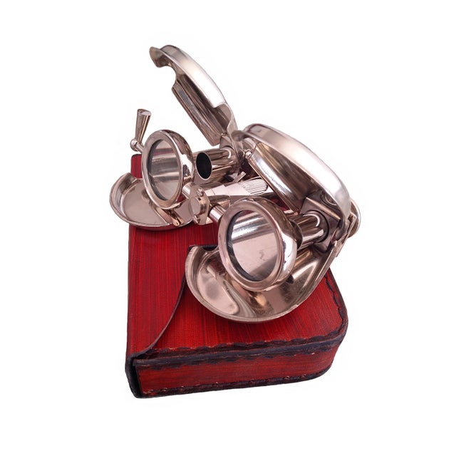 Experience timeless elegance with these antique-style nickel plated brass opera binocular glasses, a beautiful...
