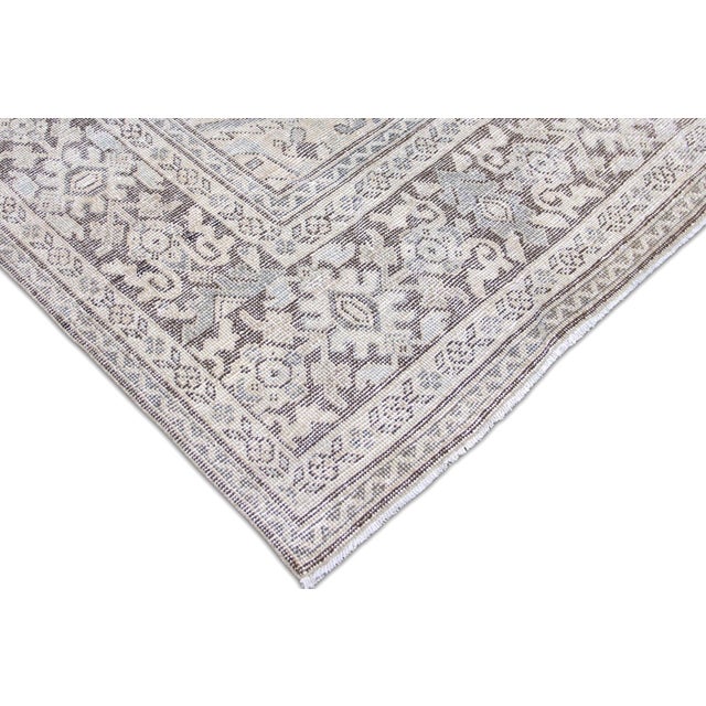 This authentic Semi Antique Persian Mahal Rug is a beautiful piece of craftsmanship, featuring a wool-on-cotton...