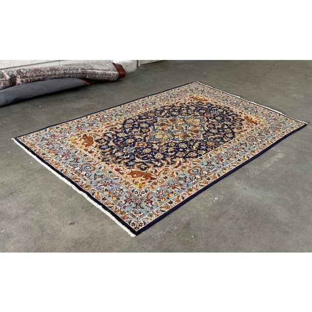 Design Plus Gallery presents a 7 ft x 11 ft Traditional Persian Floral Medallion Area Rug. The rug displays an intricate...