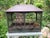 An antique birdcage from France, with a very decorative roof shape and arched wire panels. It dates from around 1850 and...