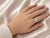 Celebrate your love with this 18K White Gold Diamond Engagement Ring, an extraordinary piece that combines brilliant round...