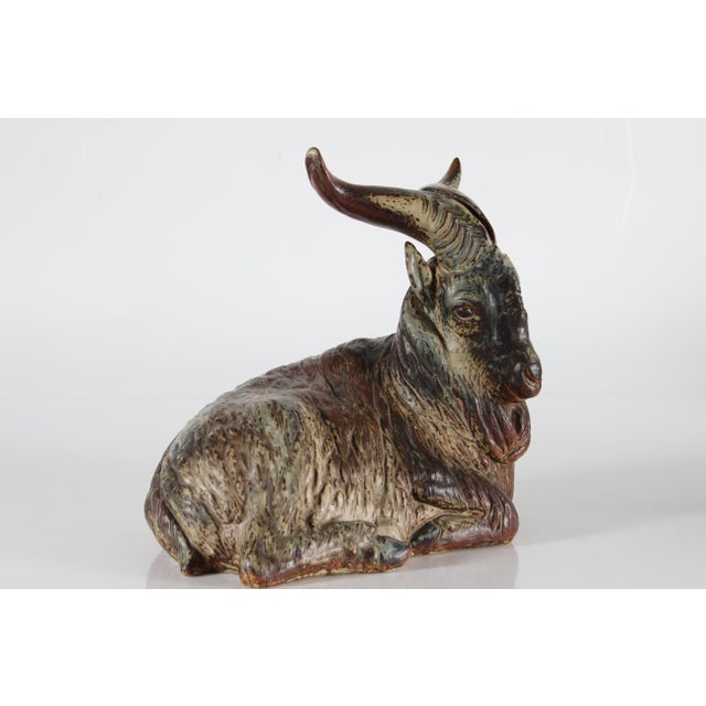 Rare stoneware figurine of a huge goat buck model no. 20853 designed by Karl Larsen (1897-1977) in 1947. Made in a serie...