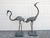 A pair of bronze garden cranes, c.1930’s A good pair of cranes with well detailed feathers and heads. One with a raised...