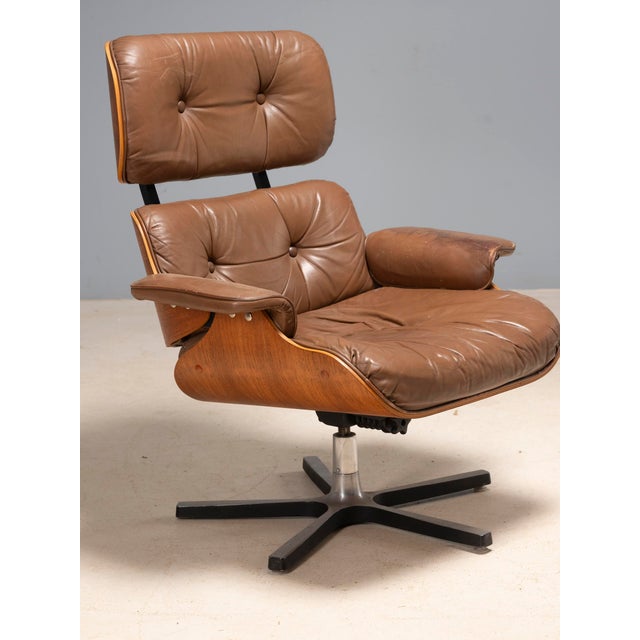 This elegant lounge chair with matching ottoman was produced in Canada in the 1960s and represents a high-quality example...
