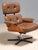 This elegant lounge chair with matching ottoman was produced in Canada in the 1960s and represents a high-quality example...