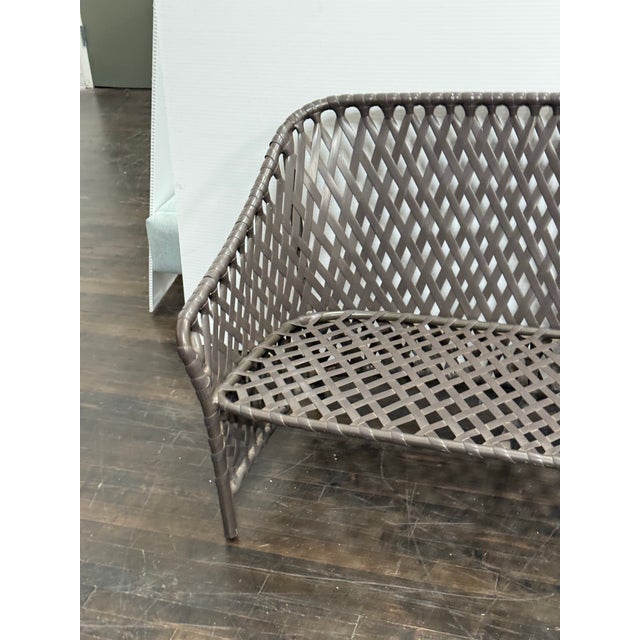 Design Plus Gallery presents a Vintage Outdoor Settee from Brown Jordan. Woven resin straps form an airy lattice across...