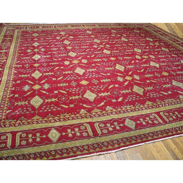 Mid 20th Century N. Indian Carpet 16'x 16' Vintage Indian Carpet, Red Ground, Circa 1960 – 16' x 16' A striking vintage...
