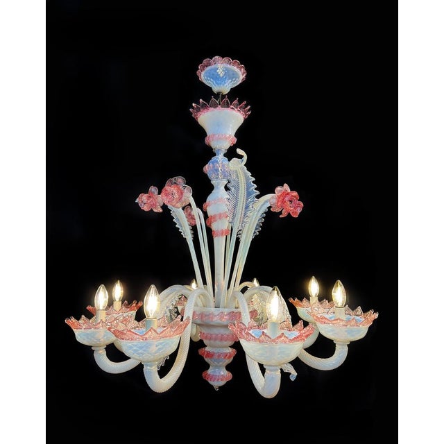Murano chandelier of awesome beauty. Lights (8) flowers and leaves in pure Murano glass paste. Each piece is a jewel. Up...