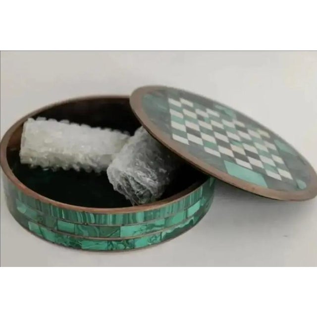 This set is truly a rare and magnificent find. It is handmade of genuine Malachite and Italian Marble with brass inlays....