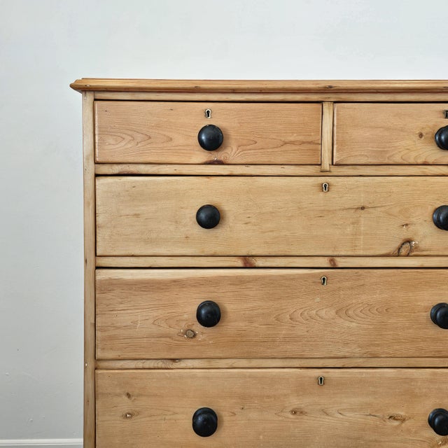 Dimensions:41.5"W x 18.5"D x 41"H A beautiful antique pine chest of drawers with a warm, softly aged finish and classic...