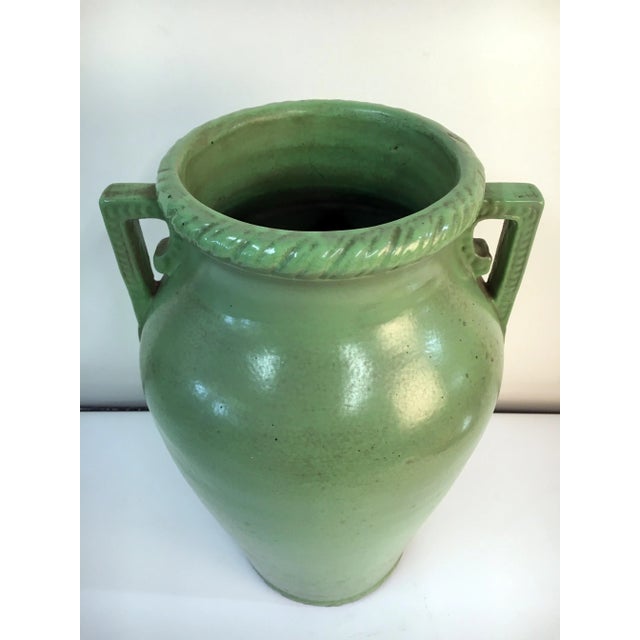 This Robinson Ransbottom Ohio Pottery Vintage Green Ceramic Oil Jar Floor Vase number 155 features a verdant grass-green...