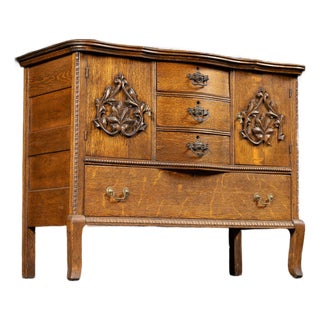 Early 20th Century Carved Oak Bow Front Sideboard For Sale