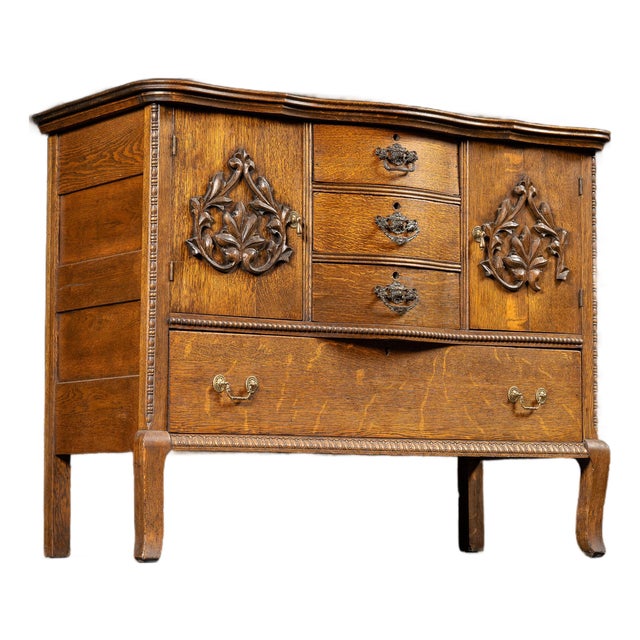 Early 20th Century Carved Oak Bow Front Sideboard For Sale