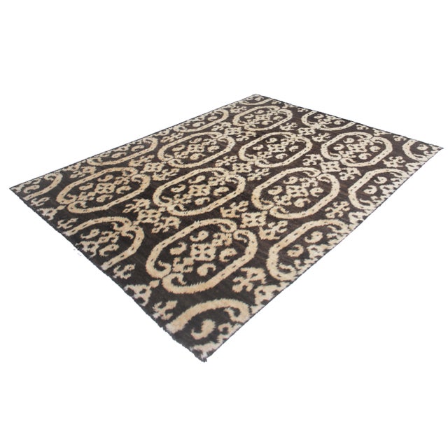 This beautiful Ikat rug is hand knotted in 2020's in Afghanistan with Floral design woven of 75% wool and 25% cotton. This...