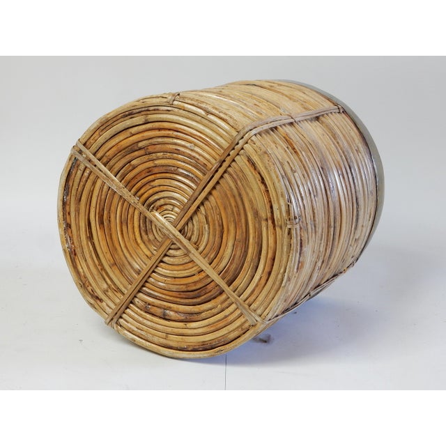 Large, circa 1960's, Italian pencil reed planter with hammered brass trim on top. Gorgeous aged patina. Not damaged or...