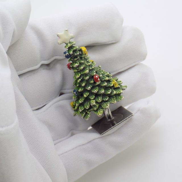 Vintage solid silver figurine depicting an ornate Christmas tree with fine enamel work, crafted in Arezzo, Tuscany, during...