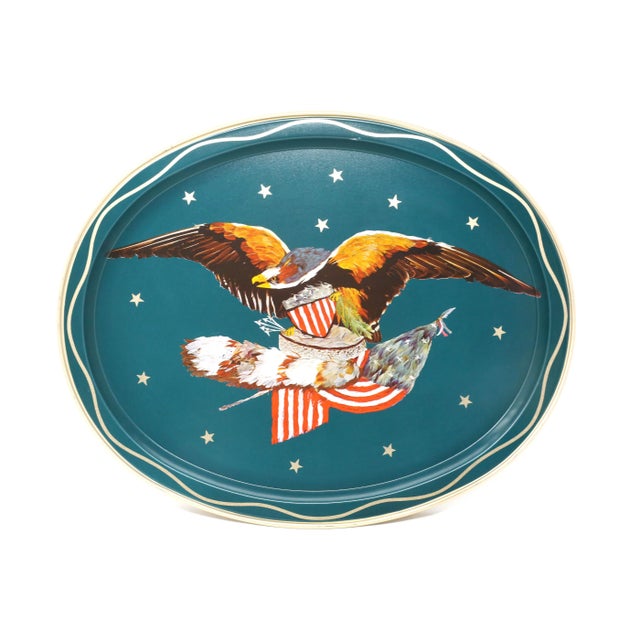 A set of 12 vintage aluminum trays, each with a printed bald eagle design on a teal colored background, with gold stars....