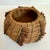 Here is a charming vintage handwoven pine needle trinket bowl, possibly dating to the later mid-20th century. The small,...