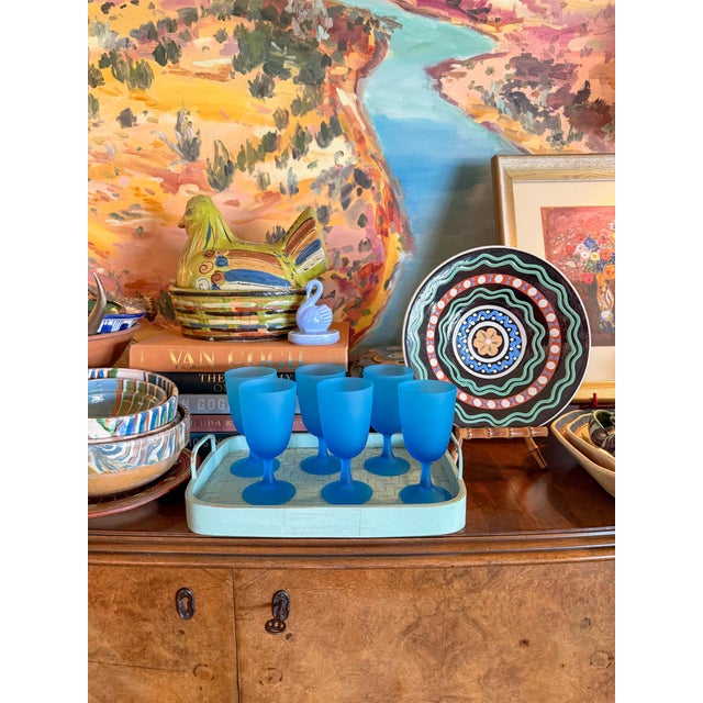 A rare set of 1960s electric blue satinato Murano glass stemware by Carlo Moretti. This set of six glasses have a...
