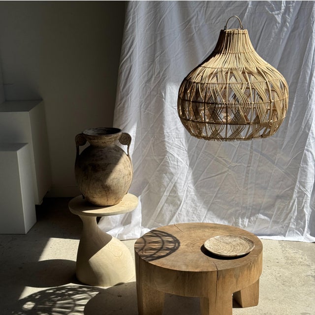Wicker pendant light or lampshade in a woven bulb shape. Beautiful quality and craftsmanship of the wicker create an...